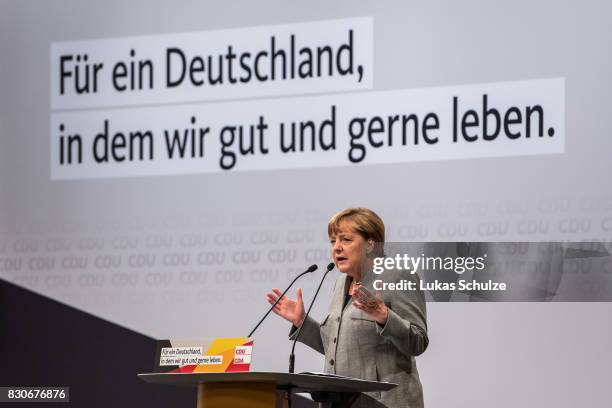 German Chancellor and head of the German Christian Democrats Angela Merkel speaks at the CDU federal election campaign opening rally on August 12,...