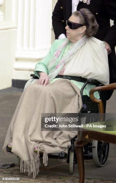 Princess Margaret in a wheelchair and with her arm in a sling, and dark glasses with the rest of the Royal Family outside Clarence House in London,...