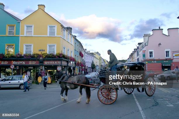 Horse & carriage turn into the main street in Kenmare, Co. Kerry . If former US president Bill Clinton is looking for a tranquil spot to write his...