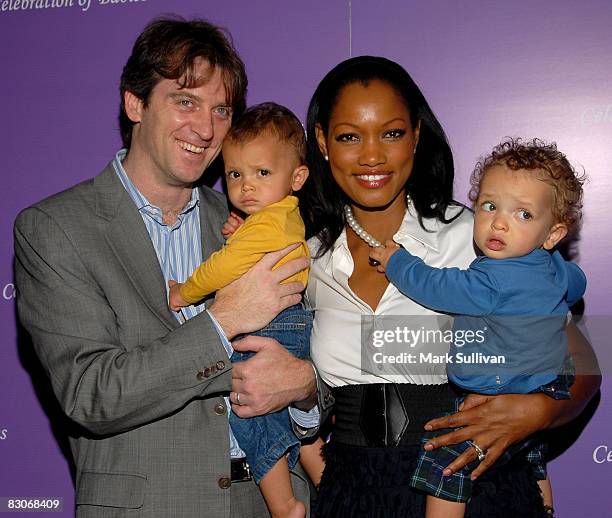 Agent Mike Nilon and actress Garcelle Beauvais with twin sons Jax and Jaid Joseph arrive at the "Celebration of Babies" silent auction and luncheon...