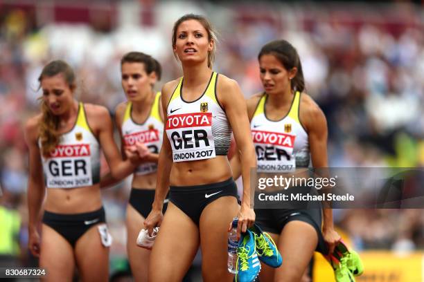 Ruth Sophia Spelmeyer, Nadine Gonska, Svea Kohrbruck and Laura Muller of Germany react after compeing in th Women's 4x400 Metres Relay heats during...