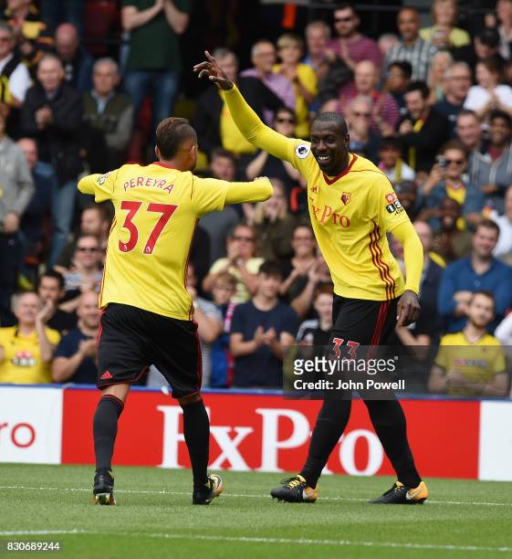 Stefano Okaka of Watford Scores the opener and celebrates during the Premier League match between Watford and Liverpool at Vicarage Road on August...