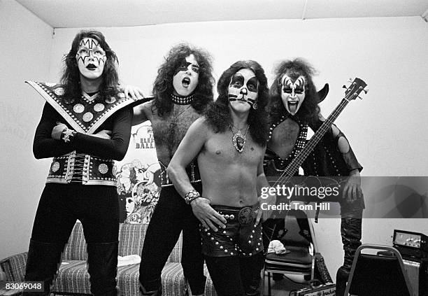 Guitarist Ace Frehley, singer-guitarist Paul Stanley, drummer Peter Criss and bassist Gene Simmons of Kiss pose in the dressing room before...