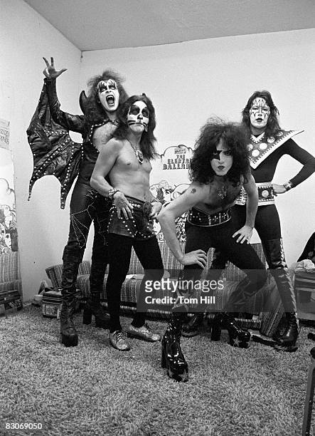 Bassist Gene Simmons, drummer Peter Criss, singer-guitarist Paul Stanley and guitarist Ace Frehley of Kiss pose in the dressing room before...