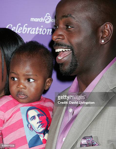 Actor Alimi Ballard and his child attend the March of Dimes' Celebration of Babies at The Beverly Hilton Hotel on September 27, 2008 in Beverly...