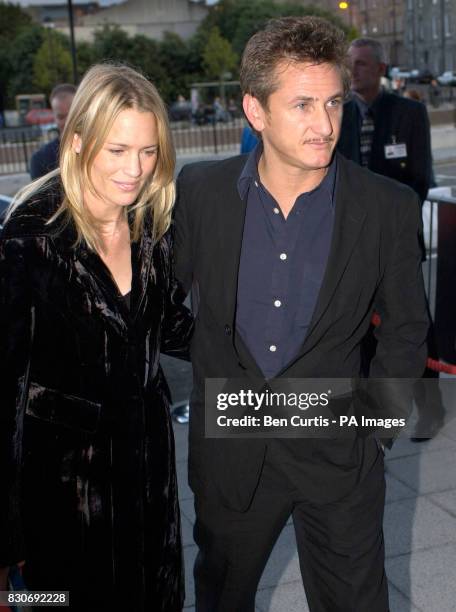 Director Sean Penn and his actress wife Robin Wright-Penn arrive for the premiere of his latest film "The Pledge" at the Edinburgh Film Festival.