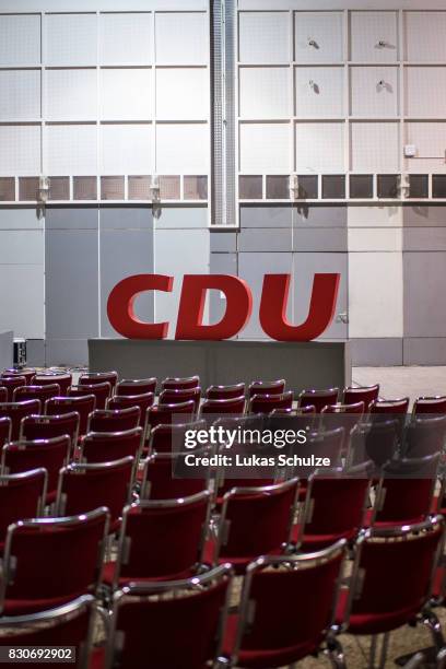 The emblem of the German Christian Democrats is seen after the federal election campaign opening rally on August 12, 2017 in Dortmund, Germany....