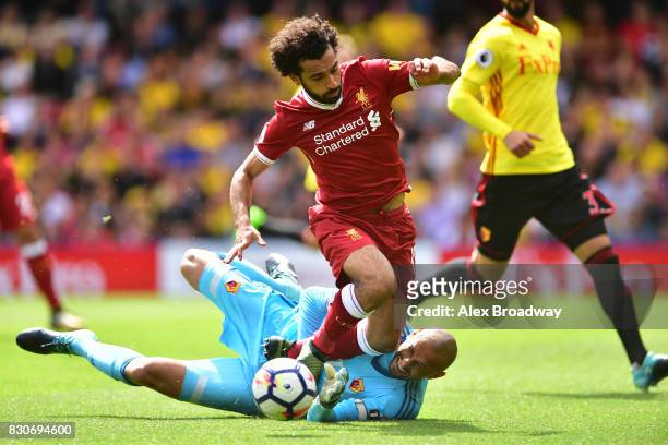 Mohamed Salah of Liverpool is fouled by Heurelho Gomes of Watford and a penalty is awarded to Liverpool during the Premier League match between...