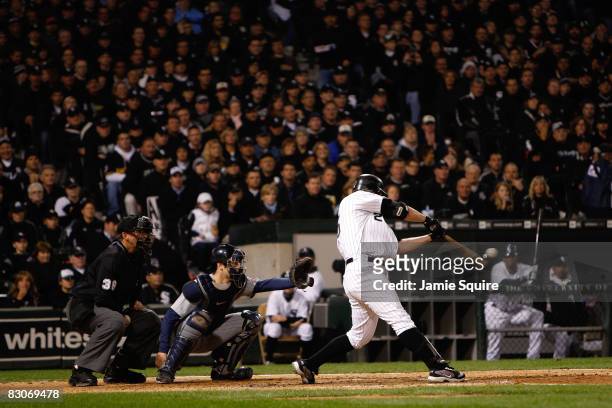 Jim Thome of the Chicago White Sox hits a solo home run to give the White Sox a 1-0 lead in the bottom of the seventh inning against the Minnesota...