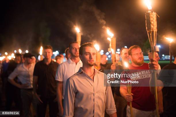 Neo Nazis, Alt-Right, and White Supremacists take part a the night before the 'Unite the Right' rally in Charlottesville, VA, white supremacists...