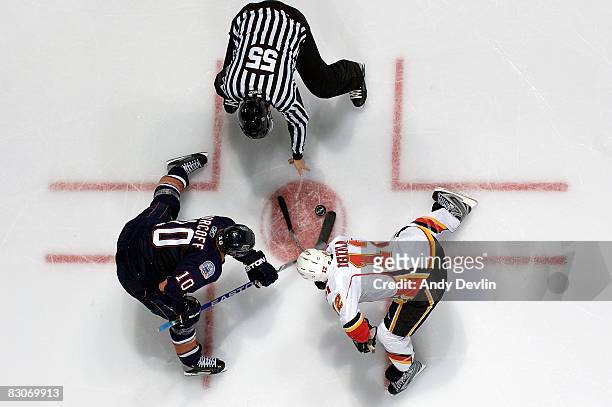 Jarome Iginla of the Calgary Flames faces off against Shawn Horcoff of the Edmonton Oilers on September 30, 2008 at Rexall Place in Edmonton,...