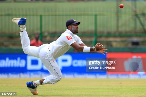 Sri Lankan cricketer Lahiru Kumara drops a catch during the 1st Day's play in the 2nd Test match between Sri Lanka and India at the Pallekele...