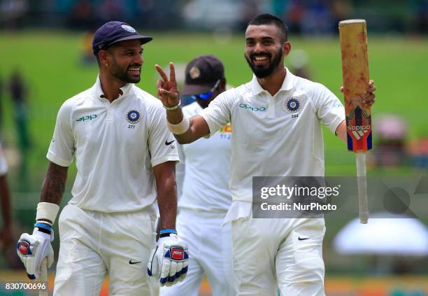 Indian cricketers Lokesh Rahul and Shikhar Dhawan walk back to the pavilion after the end of the 1st session at the 1st Day's play in the 3rd Test...