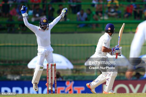 Indian batsman Ajinkya Rahane gets bowled out during the 1st Day's play in the 3rd Test match between Sri Lanka and India at the Pallekele...