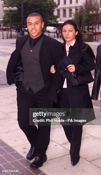 Everton footballer and under-21 player Danny Cadamarteri from West Yorkshire arrives with his girlfriend Simone Tighe at Liverpool Crown Court....