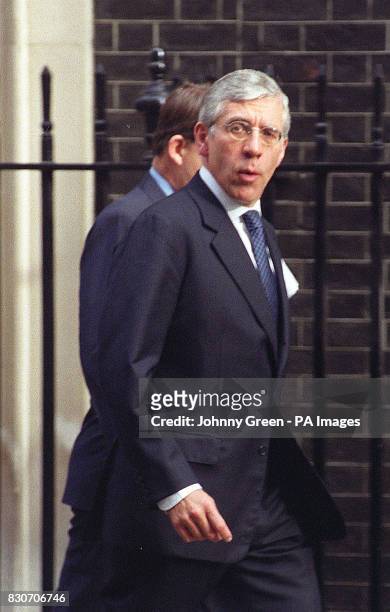 Foreign Secretary Jack Straw arrives with an aide to 10 Downing Street in London , for the cabinet's civil contingencies committee meeting with the...