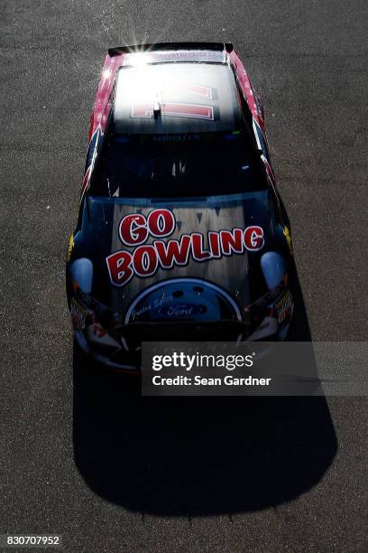 Ricky Stenhouse Jr., driver of the Go Bowling Ford, drives through the garage area during practice for the Monster Energy NASCAR Cup Series Pure...