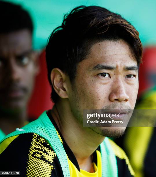 Shinji Kagawa of Borussia Dortmund sits on the bench during the DFB Cup match between 1. FC Rielasingen-Arlen and Borussia Dortmund at...