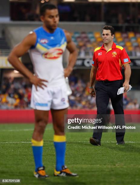 Dean Solomon, Interim Senior Coach of the Suns looks dejected after a loss during the 2017 AFL round 21 match between the Brisbane Lions and the Gold...