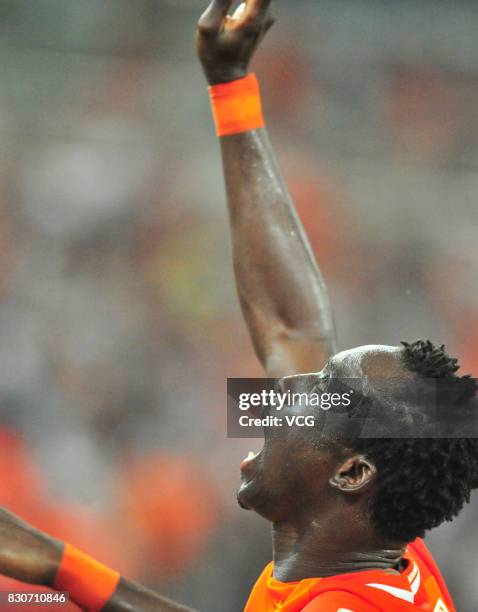 Papiss Demba Cisse of Shandong Luneng celebrates a point during the 22nd round match of 2017 Chinese Football Association Super League between...