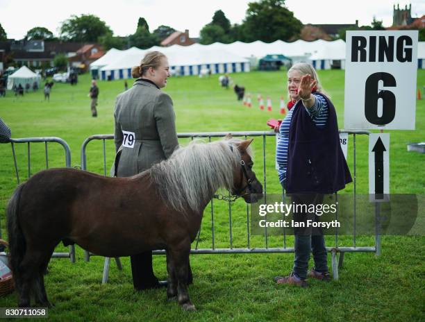 Competitors wait at the side of the show arena during the 194th Sedgefield Show on August 12, 2017 in Sedgefield, England. The annual show is held on...