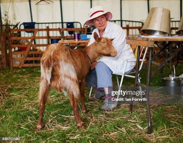 Woman sits with her goat during the 194th Sedgefield Show on August 12, 2017 in Sedgefield, England. The annual show is held on the second Saturday...