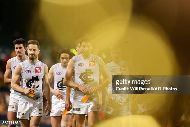 Dale Thomas of the Blues leaves the field after the teams defeat during the round 21 AFL match between the West Coast Eagles and the Carlton Blues at...