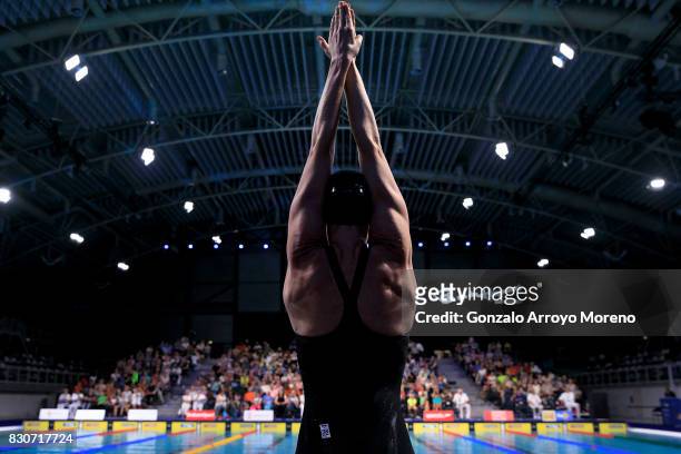 Femke Heemskerk from The Netherlands streches prior to start the Women's 200m Freestyle heats of the FINA/airweave Swimming World Cup Eindhoven 2017...