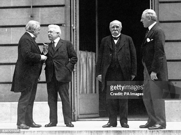 Left to right, Prime Minister David Lloyd George of the United Kingdom, Vittorio Orlando of Italy, Prime Minister Georges Clemenceau of France, and...