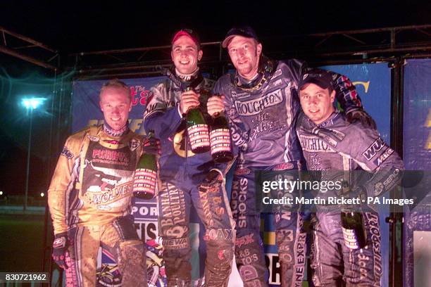 Sheffield spedway at Owlerton stadium. Jasin Crump of the Kings Lynn Knights celebrates his win with team mate Nicki Pedersen who finished 3rd and...