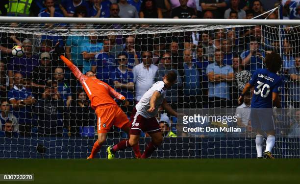 Sam Vokes of Burnley scores his sides third goal during the Premier League match between Chelsea and Burnley at Stamford Bridge on August 12, 2017 in...