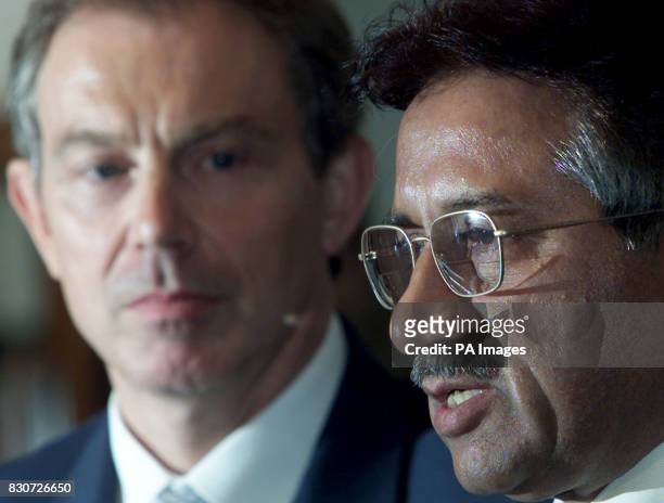 Britain's Prime Minister Tony Blair holds a press conference with President General Pervez Musharraf of Pakistan in Islamabad. Blair's visit to...