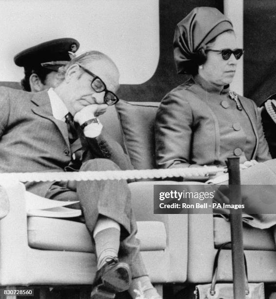 Lord Mulley taking a nap beside Queen Elizabeth II during a Silver Jubilee review at RAF Finningley.