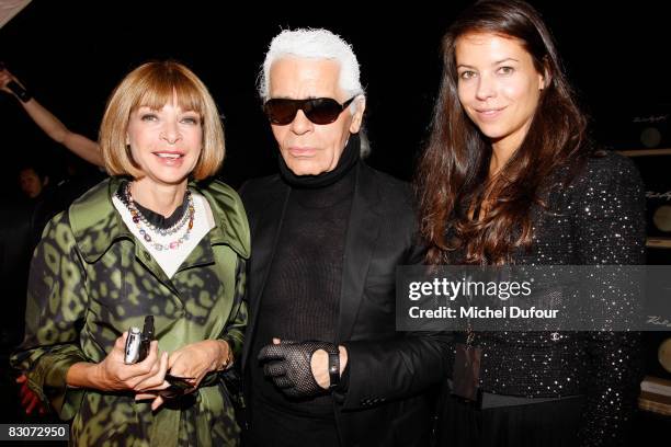American Vogue editor in chief Anna Wintour and stylist Charlotte Stockdale pose with designer Karl Lagerfeld at the Karl Lagerfeld Spring/Summer...