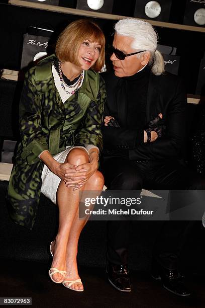 American Vogue editor in chief Anna Wintour chats with designer Karl Lagerfeld at the Karl Lagerfeld Spring/Summer 2009 show during Paris Fashion...