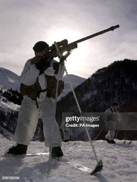 Royal Marines from 45 commando recce troop patrol high up in the hills of Kosovo. They are members of 3 Commando Brigade who might take part in any...