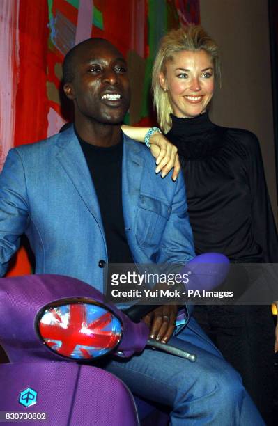 Fashion designer Ozwald Boateng with socialite Tamara Beckwith at an auction of specially commissioned Vespa scooters, in aid of Action on Addiction,...
