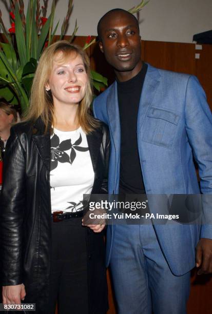 Ffion Hague, wife of former Tory leader William Hague and fashion designer Ozwald Boateng attending an auction of specially commissioned Vespa...