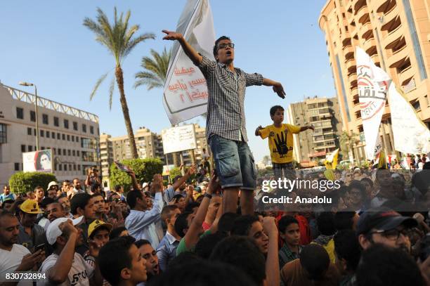 Khaled Elmasry chants slogans during a demonstration in Cairo, Egypt on October 18, 2013. Khaled Elmasry, a revolutionary young Egyptian who had to...