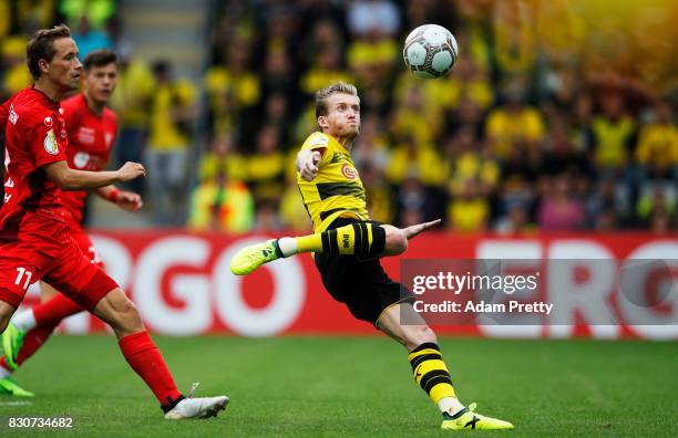 Andre Schuerrle of Borussia Dortmund takes a shot during the DFB Cup match between 1. FC Rielasingen-Arlen and Borussia Dortmund at...