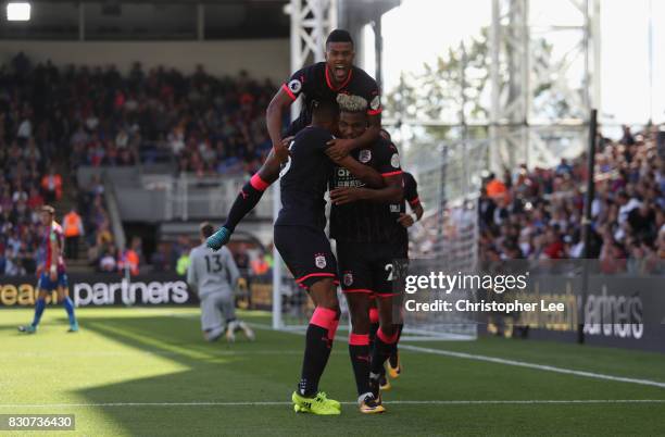 Steve Mounie of Huddersfield Town celebrates scoring his sides third goal during the Premier League match between Crystal Palace and Huddersfield...