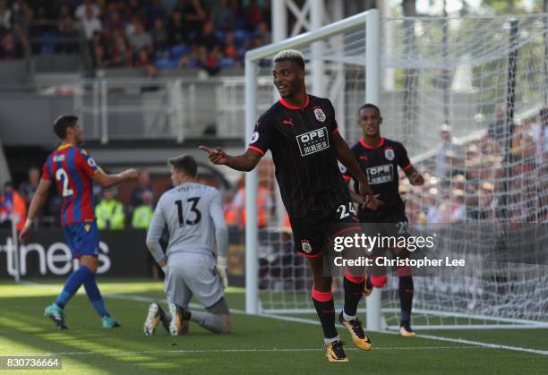 Steve Mounie of Huddersfield Town celebrates scoring his sides third goal during the Premier League match between Crystal Palace and Huddersfield...