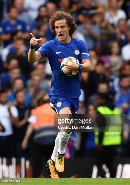 David Luiz of Chelsea celebrates scoring his sides second goal during the Premier League match between Chelsea and Burnley at Stamford Bridge on...
