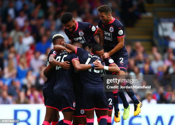 The Huddersield Town team celebrate their first goal of the game during the Premier League match between Crystal Palace and Huddersfield Town at...