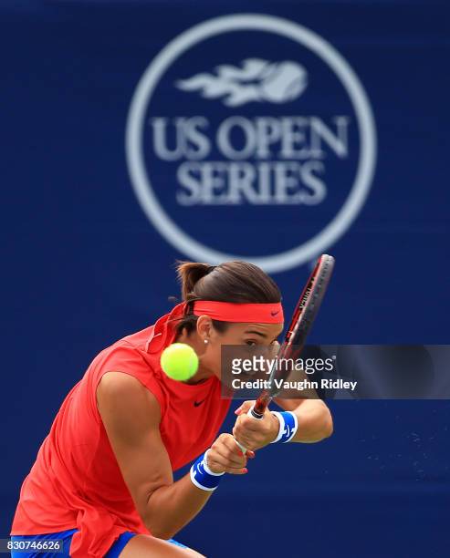 Caroline Garcia of France plays a shot against Simona Halep of Romania during a quarterfinal match on Day 8 of the Rogers Cup at Aviva Centre on...