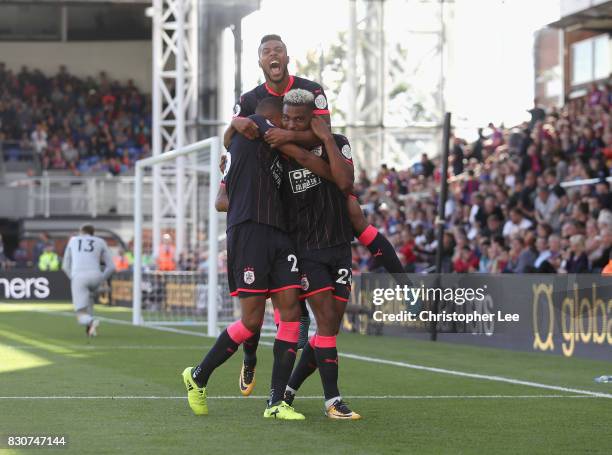 Steve Mounie of Huddersfield Town celebrates scoring his sides third goal during the Premier League match between Crystal Palace and Huddersfield...