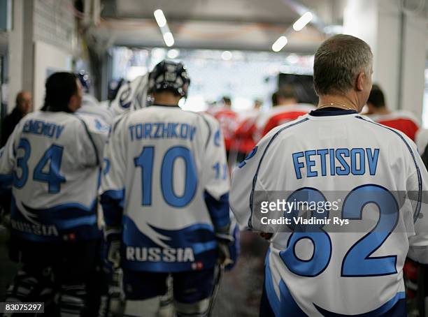 Russian ice hockey legend Viacheslav Fetisov and his team mates wait in the tunnel prior to the Victoria Cup Legends Match between Switzerland and...
