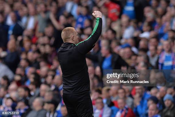 Hibernian manager Neil Lennon gestures to the Rangers fans after Hibs first goal during the Ladbrokes Scottish Premiership match between Rangers and...