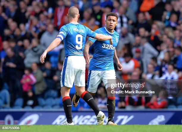 James Tavernier of Rangers celebrates scoring in the second half with team mate Kenny Miller during the Ladbrokes Scottish Premiership match between...