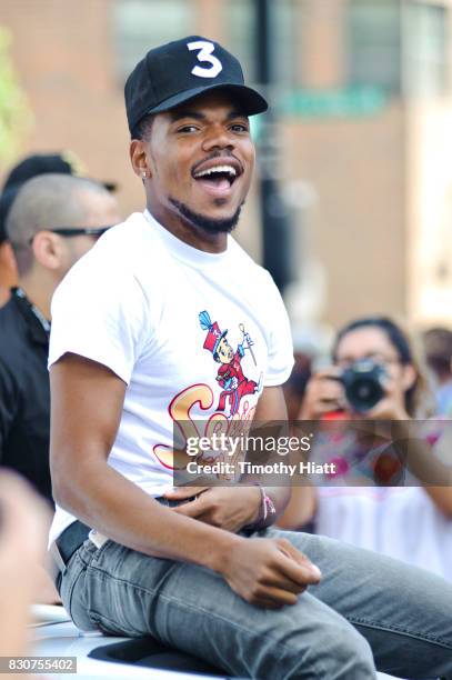 Chance The Rapper serves as Grand Marshal and donates 30,000 gift bags with school supplies at the 2017 Bud Billiken Parade on August 12, 2017 in...